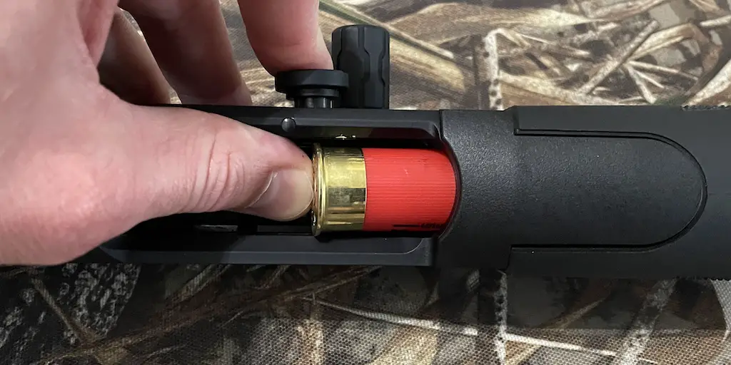 picture of mossberg 940 pro field review button 2
